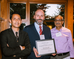 Mark Trottier receives his Distinguished Academic Staff Award